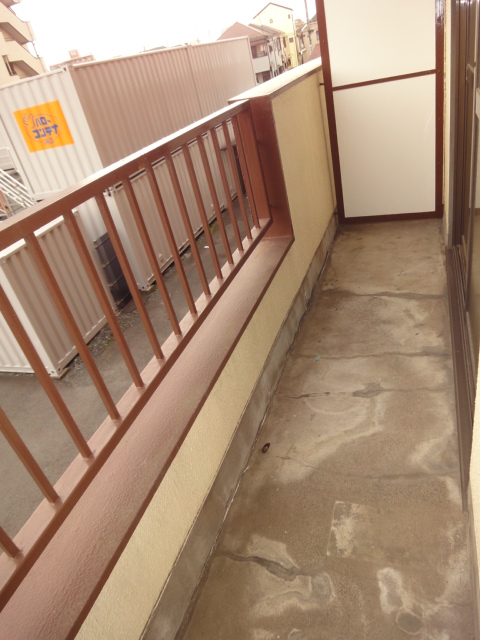 Balcony. Front because the parking lot is a good per yang! 