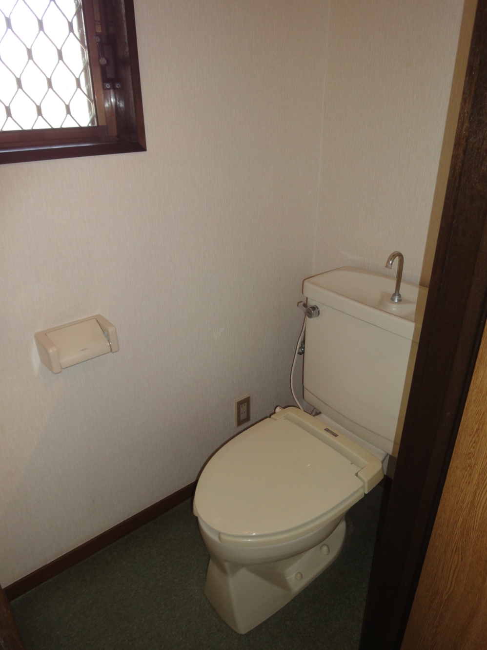 Toilet. Daytime is not need lighting.