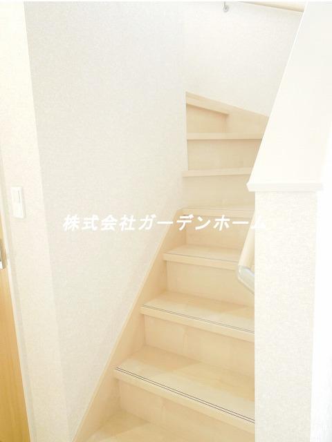 Model house photo. Staircase with a handrail