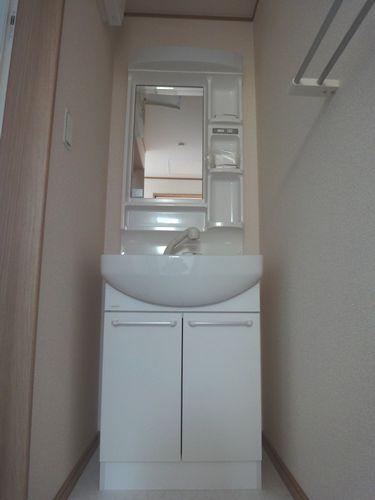 Wash basin, toilet. Bathroom vanity