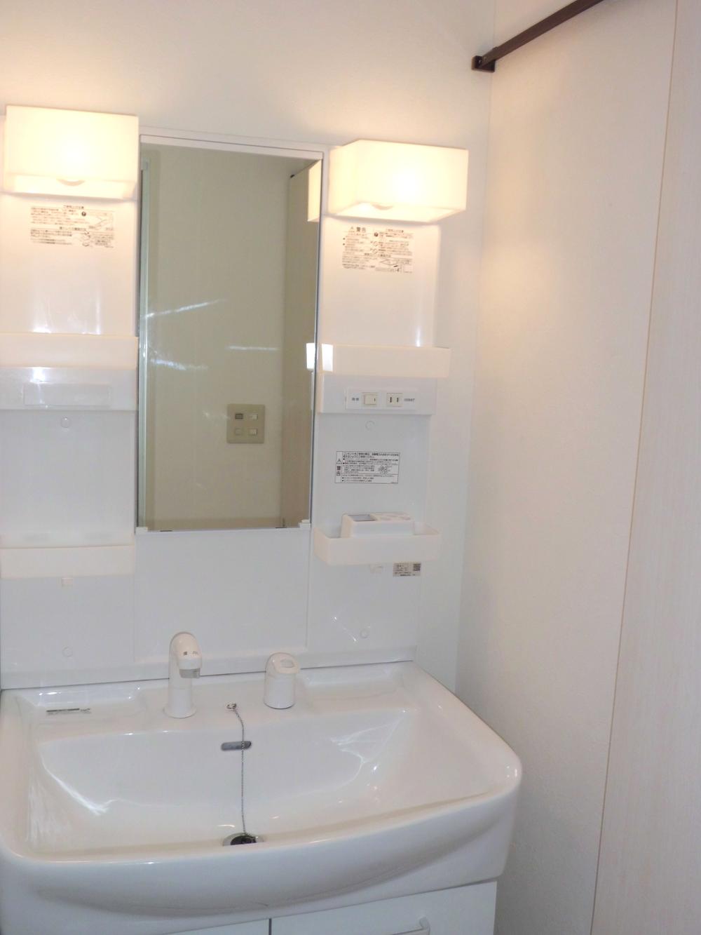 Wash basin, toilet. Bathroom vanity
