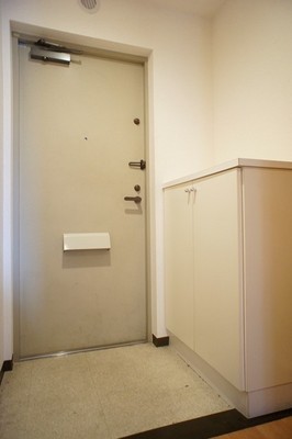 Entrance. There shoe box to the left on the front door