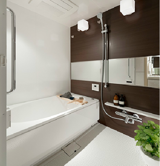 Bathing-wash room.  [Low-floor type unit bus] Suppress the straddle sales to bath to about 450mm, Steps of the entrance was also as much as possible resolved, Adopt a unit bus of the low-floor design. Installing a handrail on the wall. It can and out of the bathtub while caught in the handrail, Is a specification-friendly people. Since the tub edge is wide puts sitting at the time of bathing. further, It can be bathing from warm in the bathroom, Adopt a "TES type bathroom heater dryer" of Tokyo Gas. In ventilatory function, It reduces the occurrence of mold. It is also convenient to dry out the laundry on a rainy day.