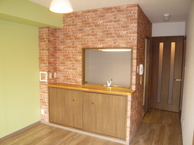 Living and room. It finished with accent cross of brick