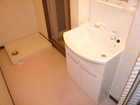 Washroom. Independent wash basin ・ Laundry Area