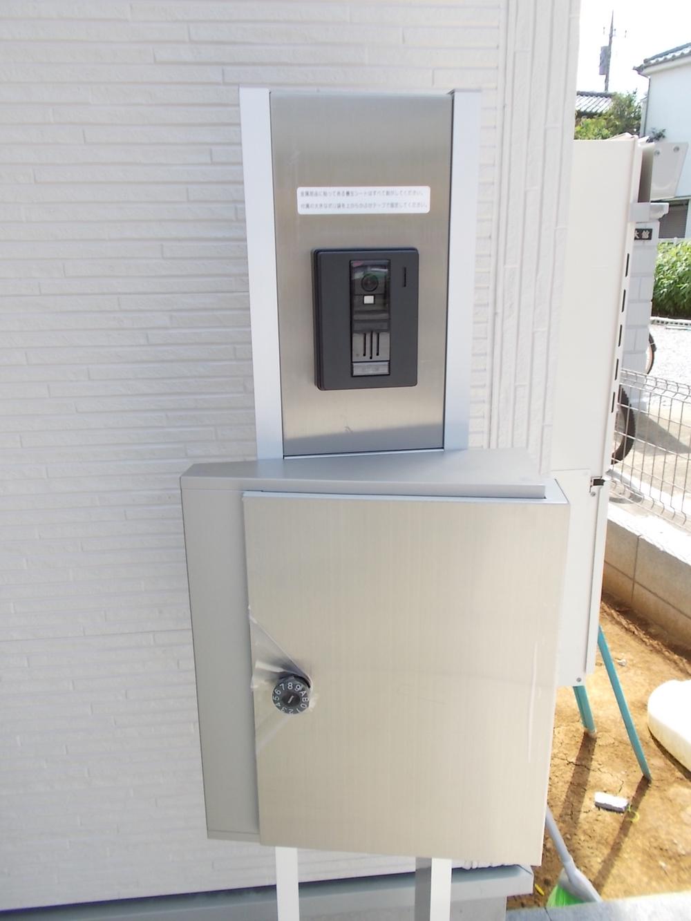 Entrance. Visitor intercom installation with a TV monitor at a glance at the top of the front door post (same specifications)