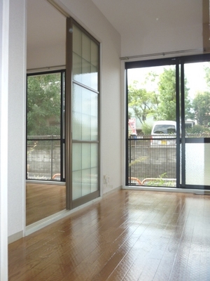 Living and room. It is a photograph of a separate room of the same properties.