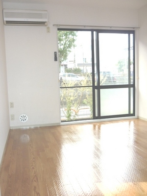 Living and room. It is a photograph of a separate room of the same properties.