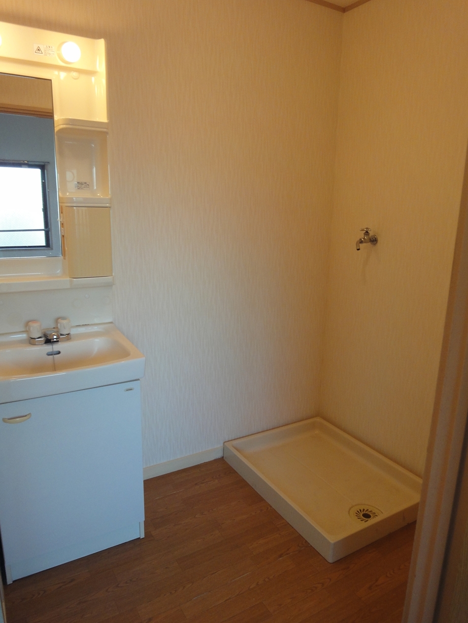 Washroom. A separate wash basin in the dressing room