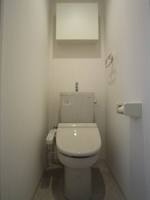 Toilet. It is a photograph of the same type Property, Please reference