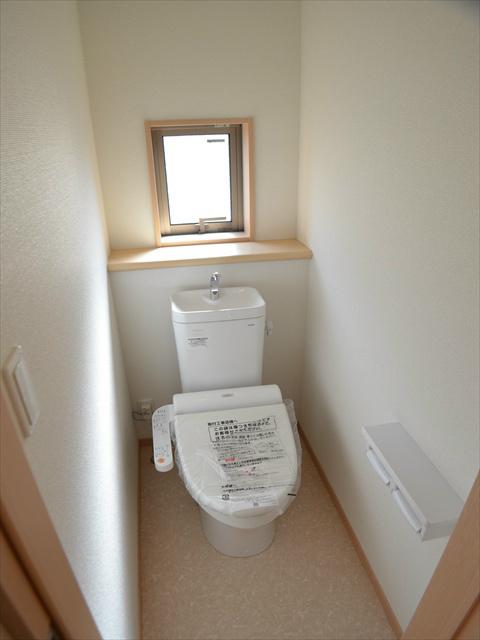 Toilet. Toilet with a small window