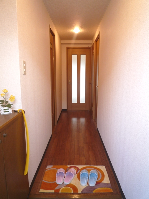 Entrance. With cupboard