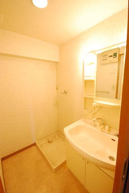 Washroom. Waterproof bread with in-room washing machine storage