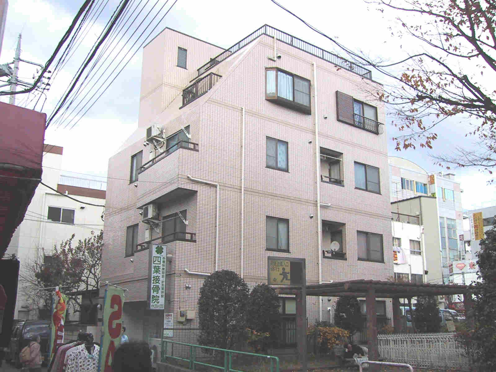 Building appearance. Pink is a stylish apartment