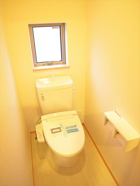 Toilet. With window to the toilet