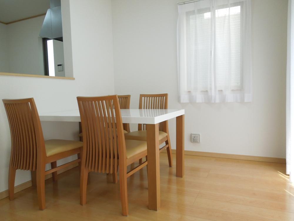 Model house photo. Bright dining