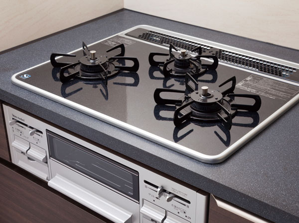 Kitchen.  [Glass top stove] Care is likely to glass top plate.