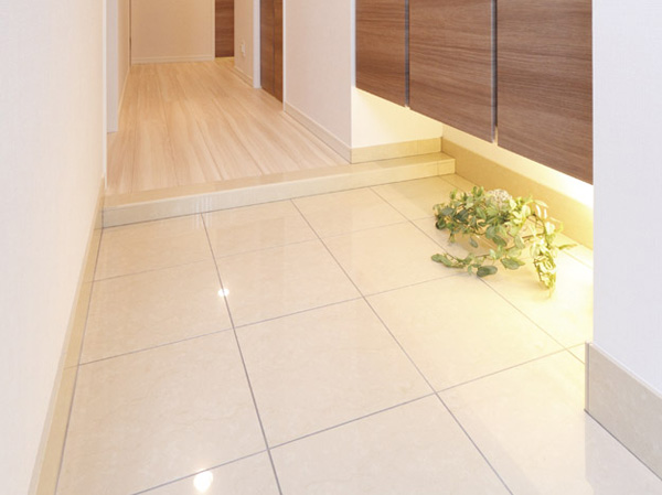 Interior.  [Tiled entrance floor] Bright and some clean entrance adopts paste graceful quaint tile. And finished with a comfortable space to greet comfortably the visitors.