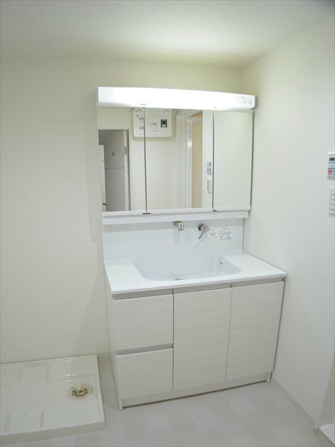 Wash basin, toilet. Happy to get dressed