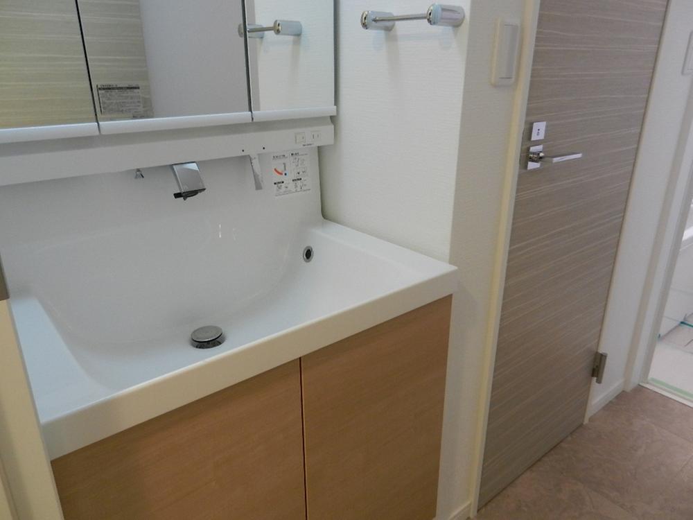 Wash basin, toilet. Seller selling other property construction photo