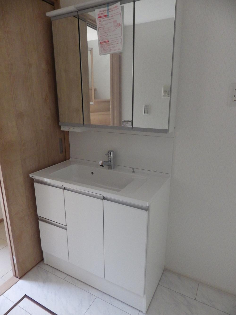 Wash basin, toilet. Bathroom vanity