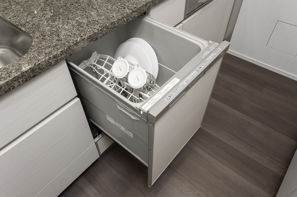 Dish washing and drying machine