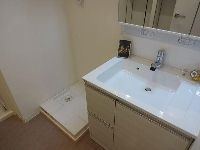 Wash basin, toilet. Bathroom vanity