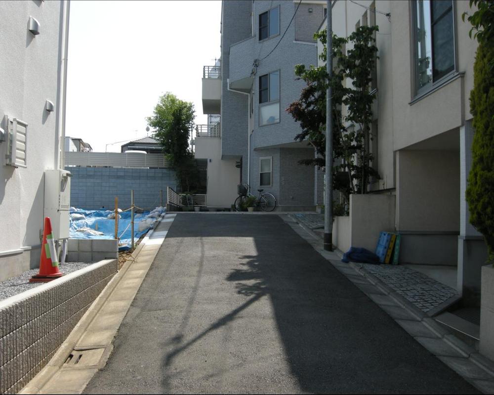 Local appearance photo. FG Building is a road photo of the northwest side. 