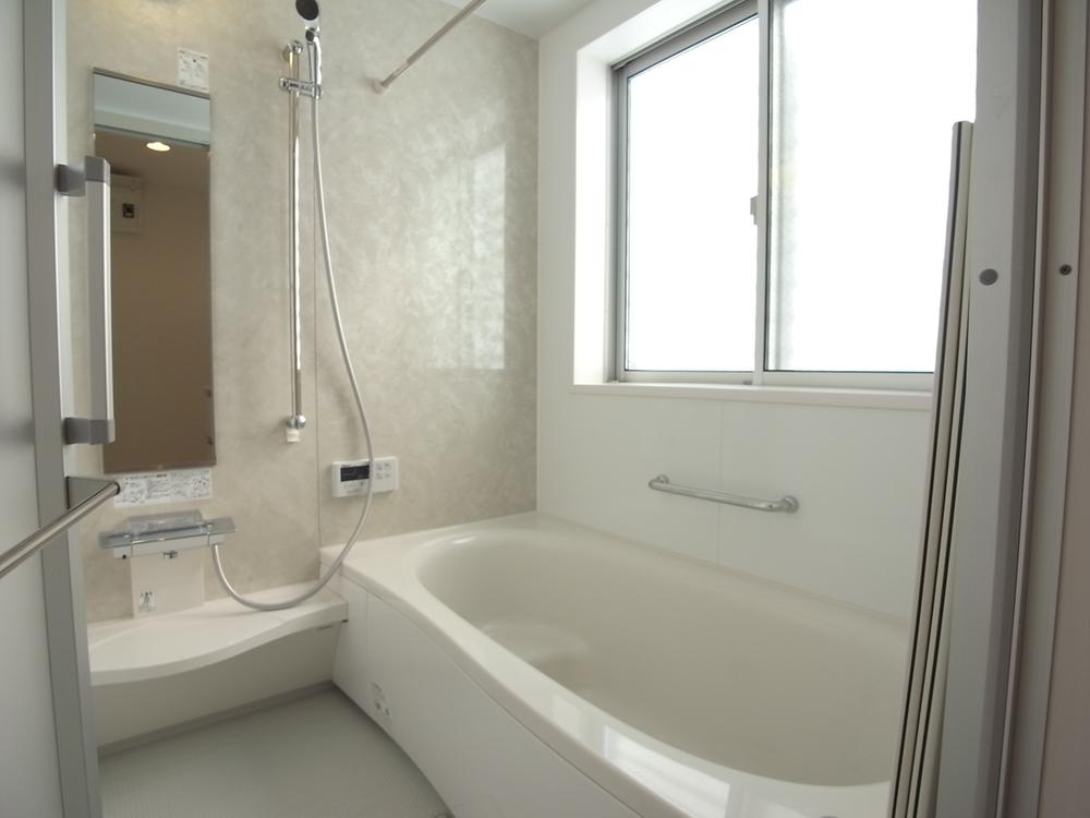 Bathroom. Bathing also bright!