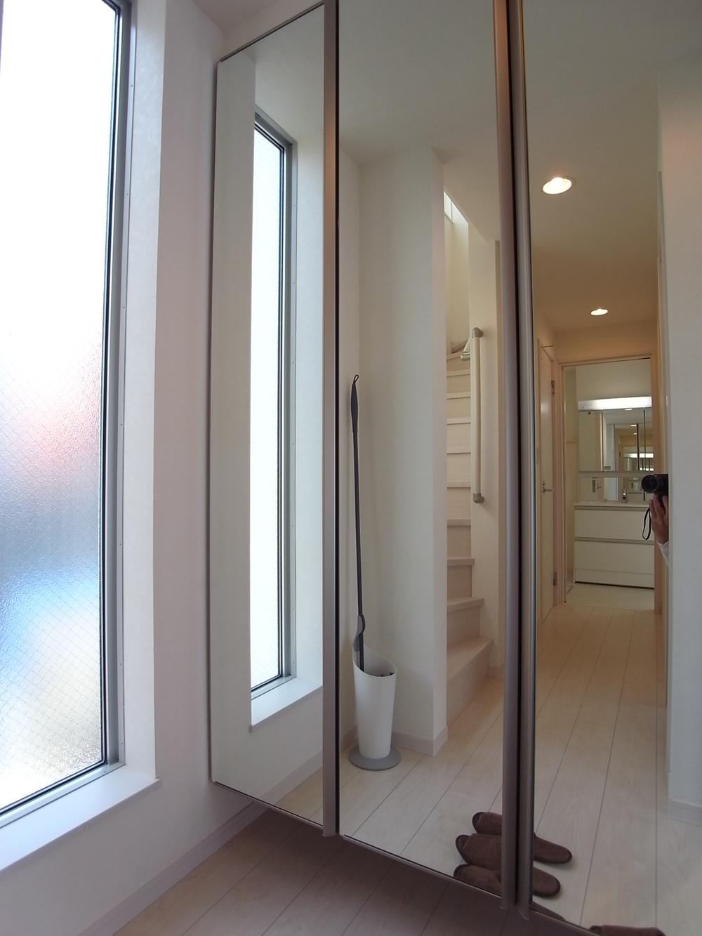 Entrance. Going out check in three-sided mirror