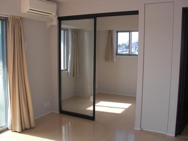 Non-living room. It is a photograph of the corner room. Door was put in the option