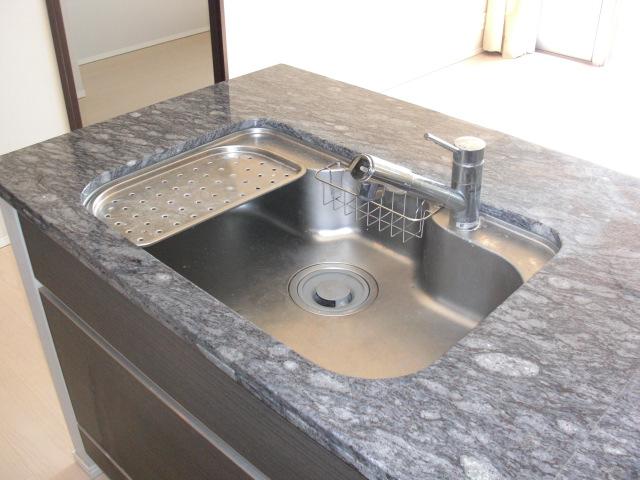 Kitchen. Sink photo, There is a water purification cartridge.