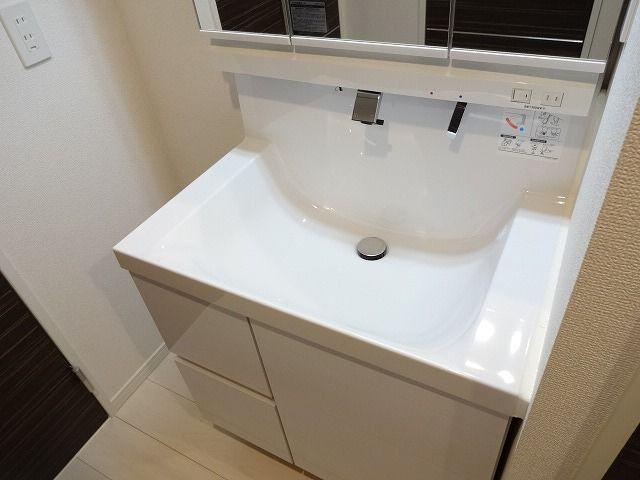 Wash basin, toilet. Bathroom vanity