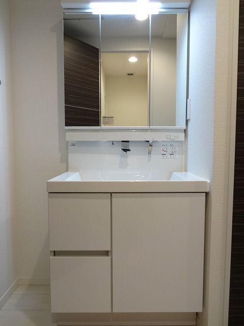 Wash basin, toilet. Bathroom vanity