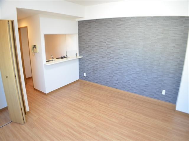 Living. Living room wall is a stylish interior with some tiled.