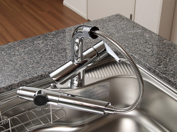 Kitchen.  [Water purifier integrated shower faucet] Supply at any time a hygienic and tasty water. Since the shower head is pulled out freely, Sink of clean is easy.