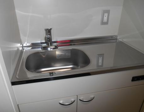 Kitchen. Another room is a reference photograph