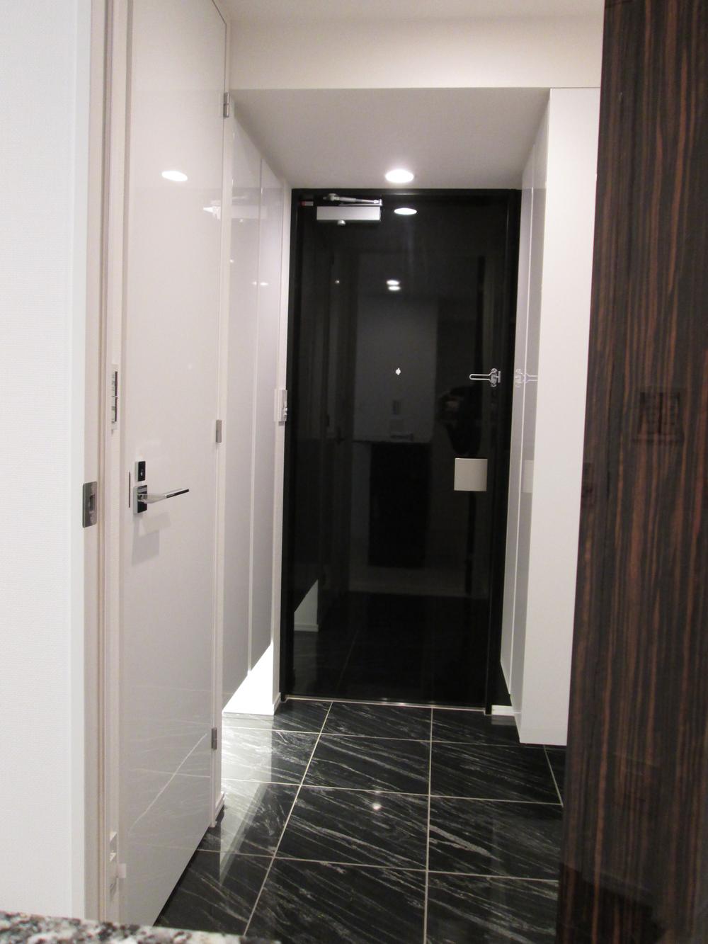 Entrance. Entrance door will enhance crime prevention in touch no keyhole formula. Floor stone paste.