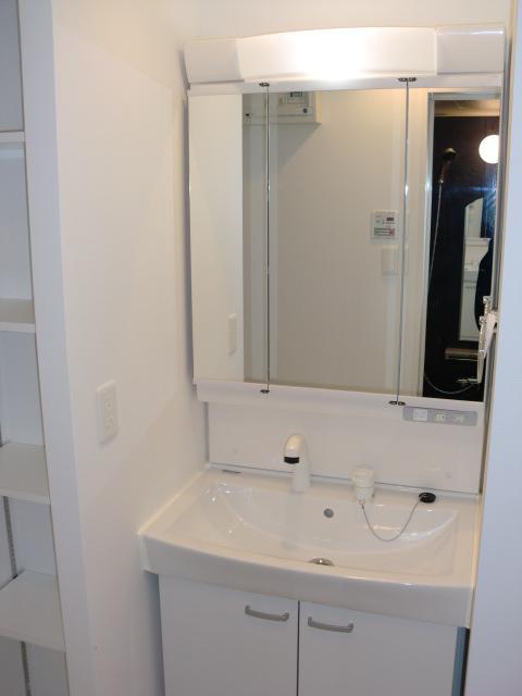 Wash basin, toilet. Bathroom vanity