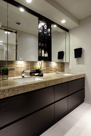 Bathing-wash room.  [bathroom] Counter tops of natural stone Ya, Calm space in which the light brown to keynote. And, High-quality equipment have been installed to stick to comfortable to use.