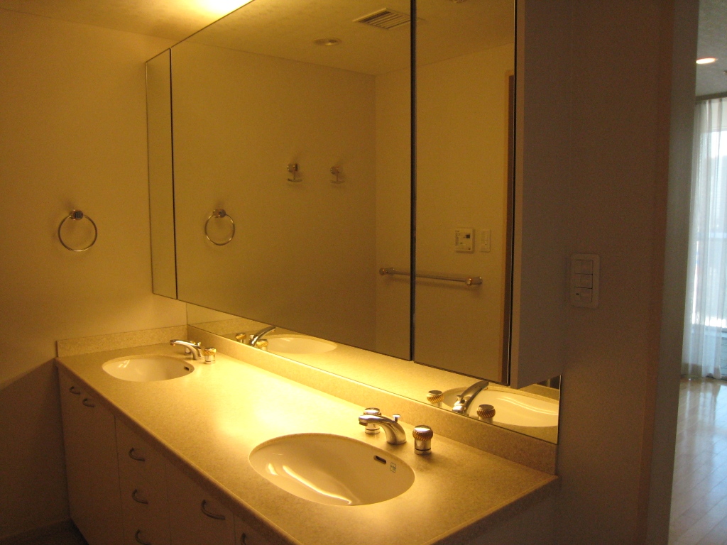 Washroom. Wash basin in the master bedroom are two.