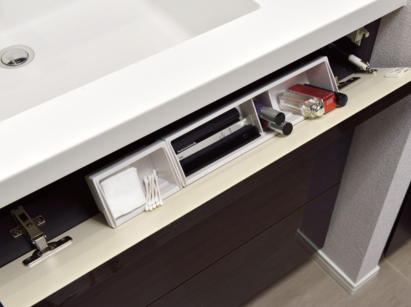 Bathing-wash room.  [Front pocket] Utilizing the dead space of the wash bowl front, The front pocket was established. Manicure and Cotton, Also fits neat fine makeup tool.