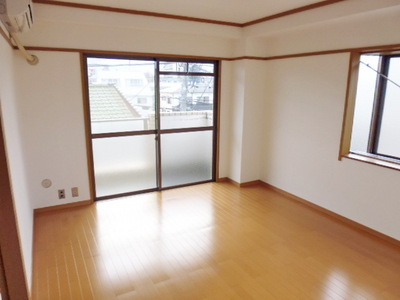 Living and room. It is a photograph of the room