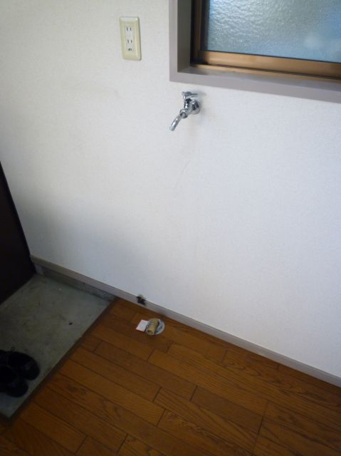 Other room space. There is a washing machine yard in the room.