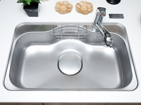 Kitchen.  [Wide sink and water purifier integrated hand shower faucet with pocket] Clean up Ya after the big cookware, Wide sink a lot of material washing can be a breeze. Convenient pocket is attached to organize small items. Also, A multi-functional water purifier integrated hand shower faucet comes standard with a simple styling.