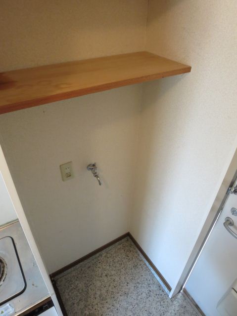 Washroom. Washing machine Storage.