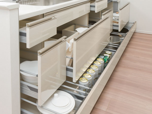Kitchen.  [Sliding storage] Storage of system kitchens, It can be effectively utilized in the prone cabinet in a dead space, It has adopted a sliding storage.