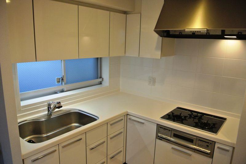 Kitchen. Convenient to put away a large dish or pot in storage rich slide storage and wide sink