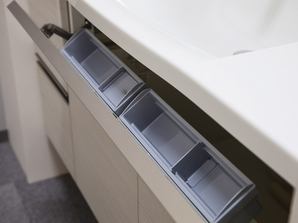 Bathing-wash room.  [Basin pocket storage] Before wash bowl, Installing a pocket that can hold small items and cosmetics products in the smart. Comfortable easy to remove.