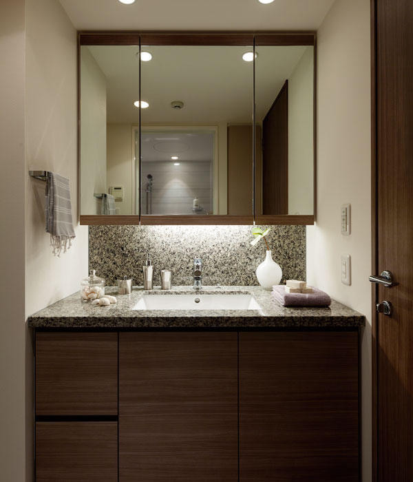 Bathing-wash room.  [Powder Room] The vanity of the Powder Room, Adopt a granite top plate. Heavy texture and glossy beauty is adorned with grace the wash room.